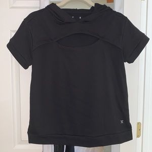Cute black shirt with opening in the front for some sass.
